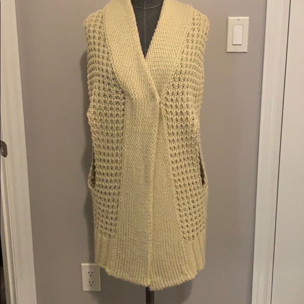 Long cable knit sweater vest
